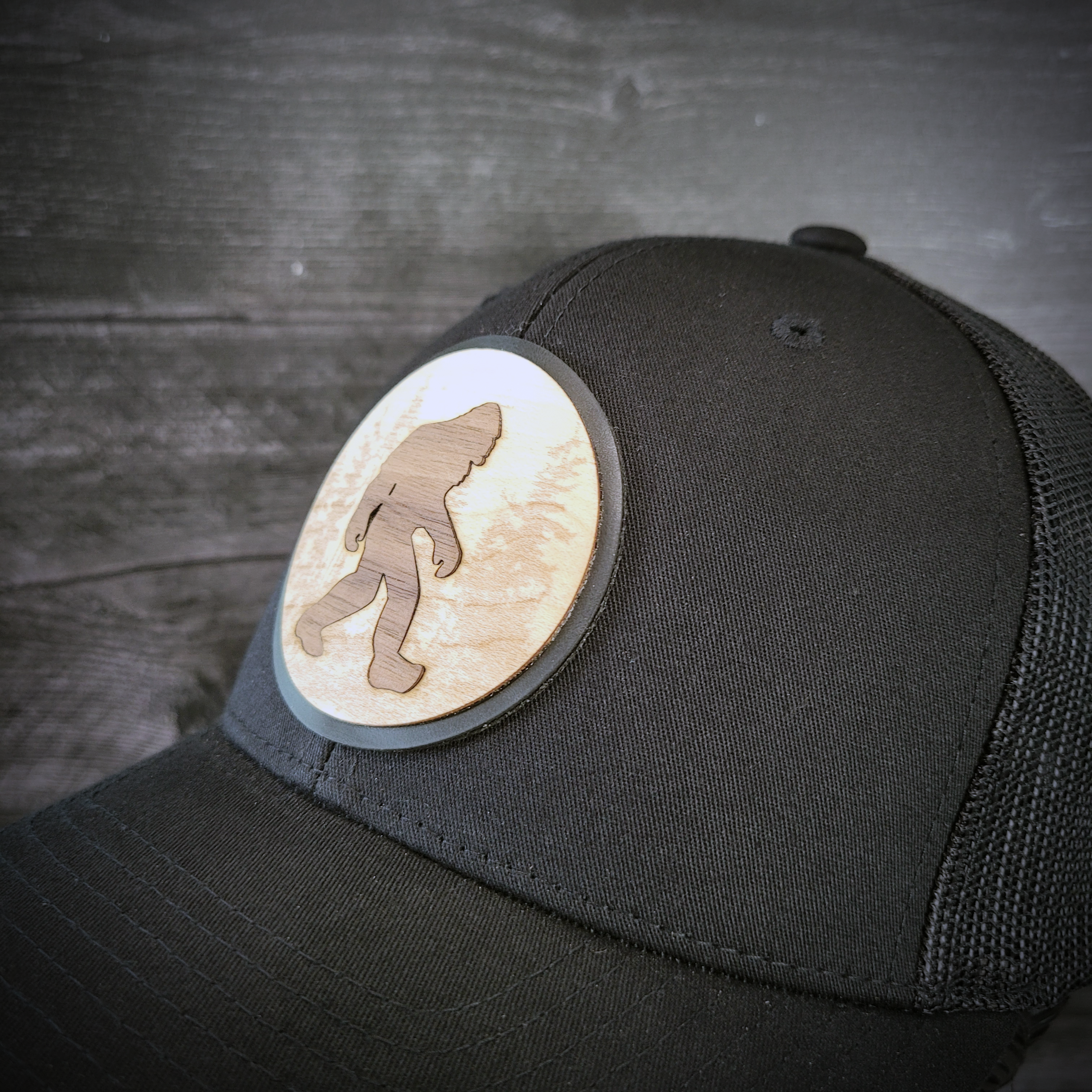 🦶🌲 The Hide & Seek Champion – Bigfoot Wooden Patch Trucker Hat