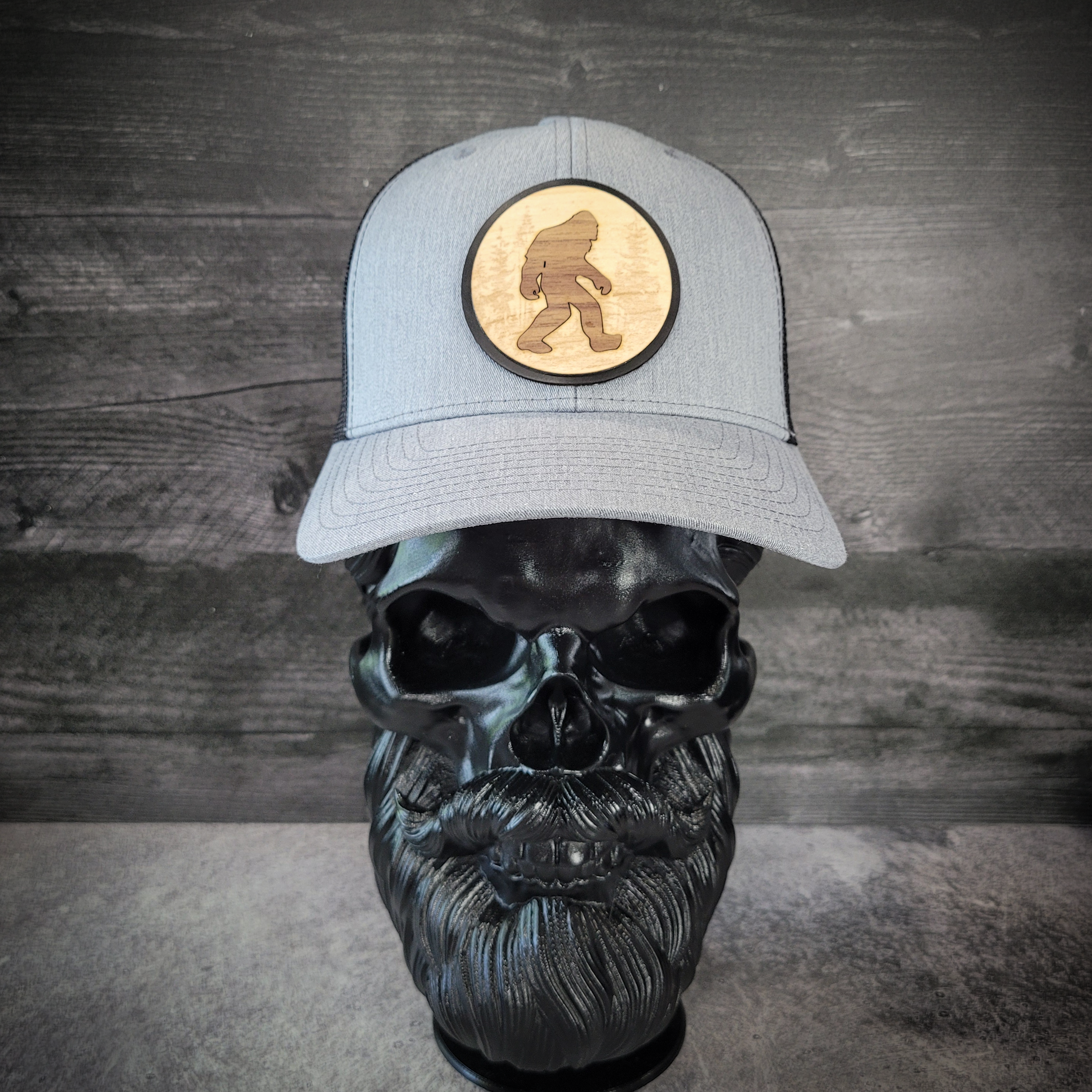 🦶🌲 The Hide & Seek Champion – Bigfoot Wooden Patch Trucker Hat