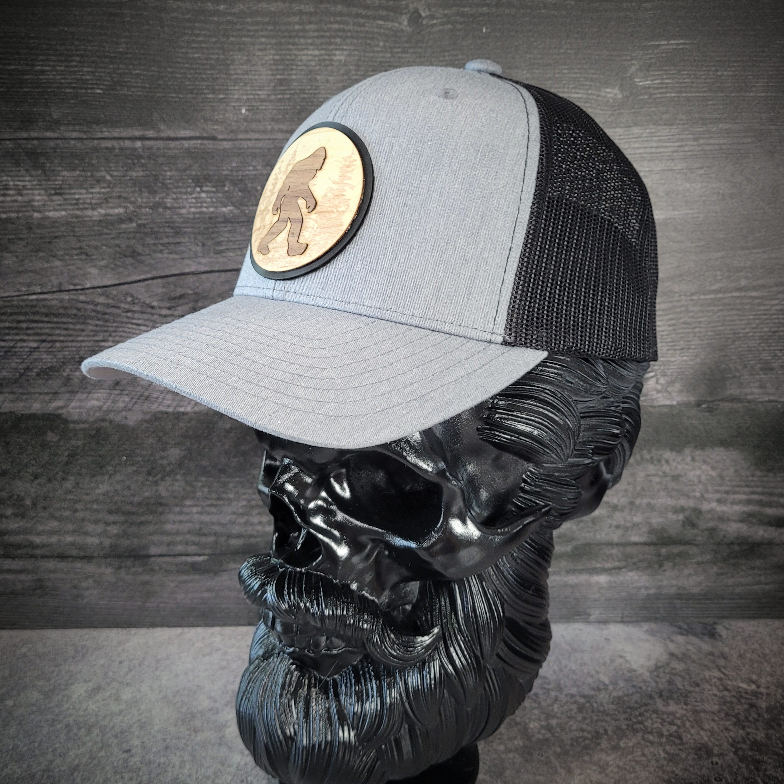 🦶🌲 The Hide & Seek Champion – Bigfoot Wooden Patch Trucker Hat