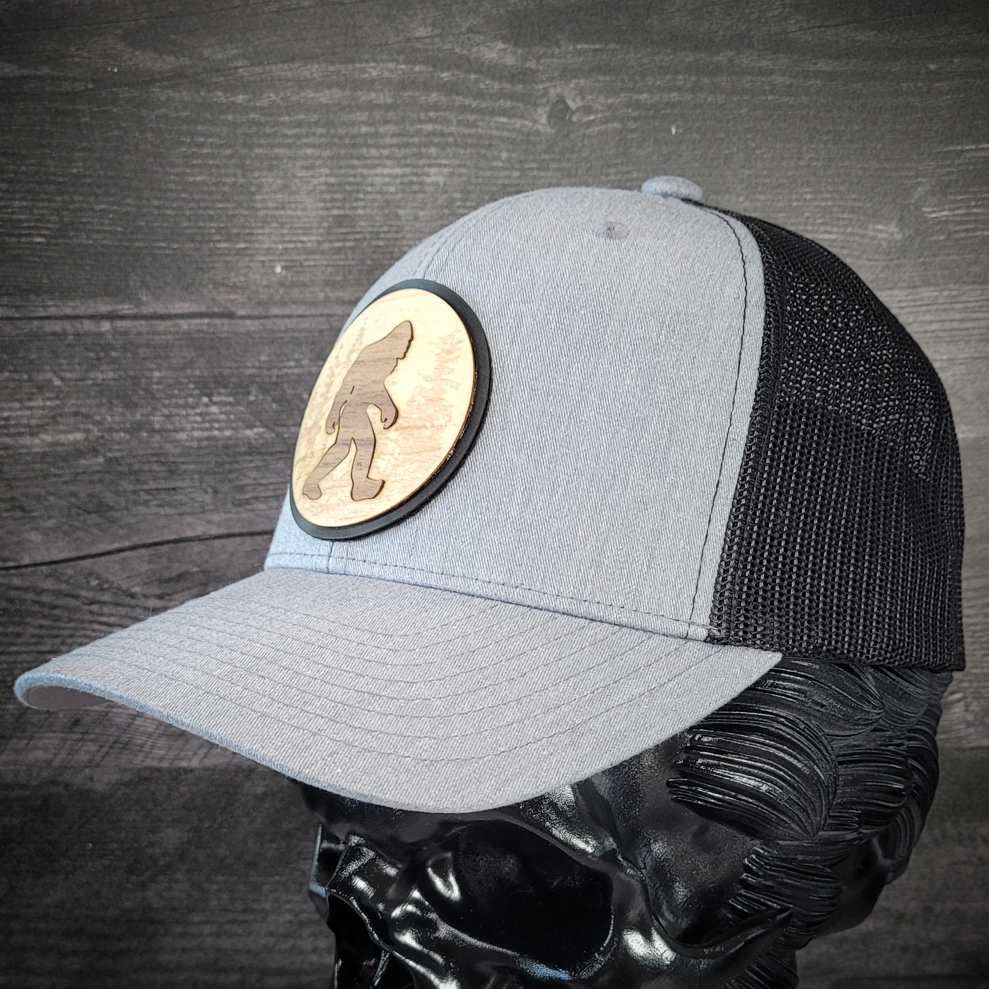 🦶🌲 The Hide & Seek Champion – Bigfoot Wooden Patch Trucker Hat