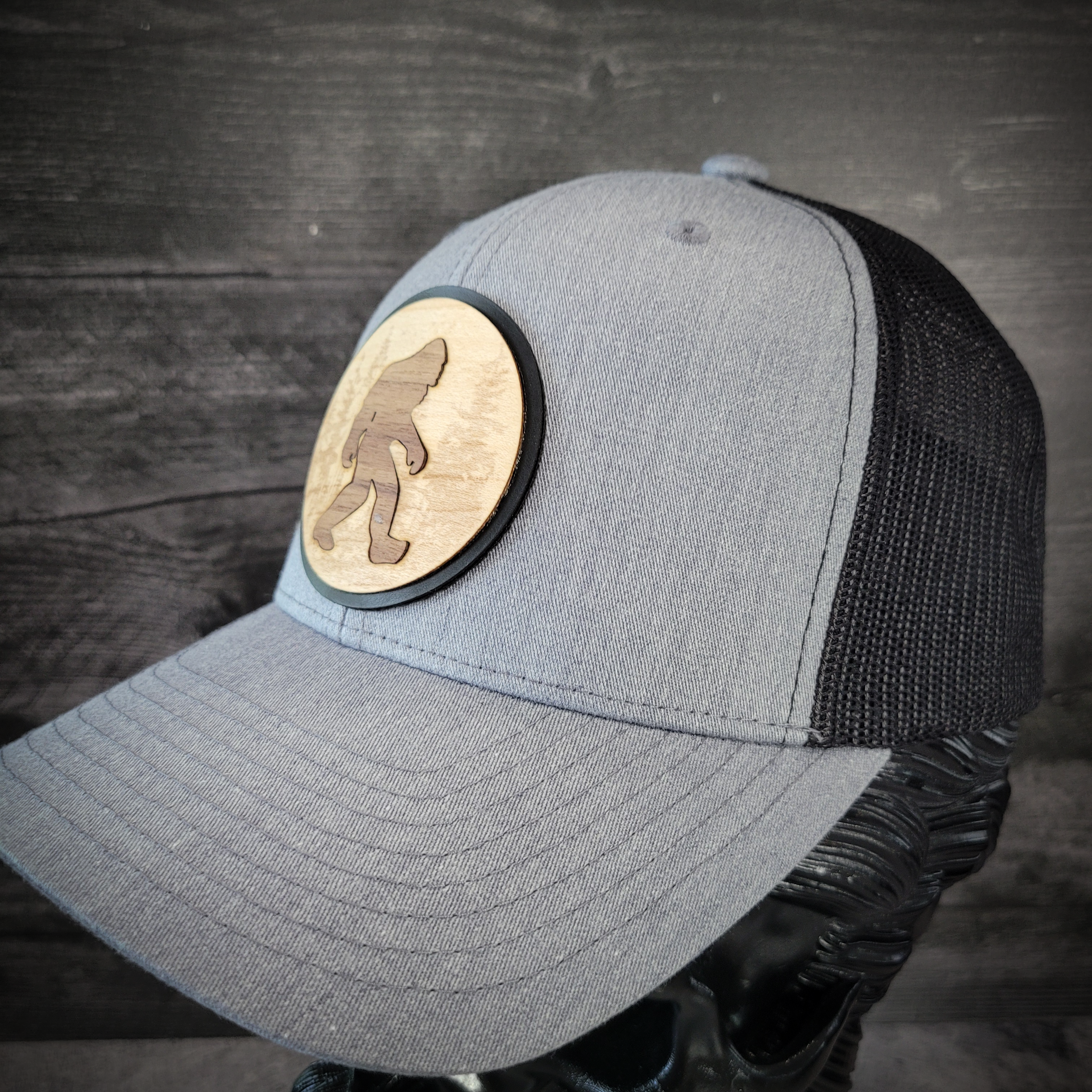 🦶🌲 The Hide & Seek Champion – Bigfoot Wooden Patch Trucker Hat