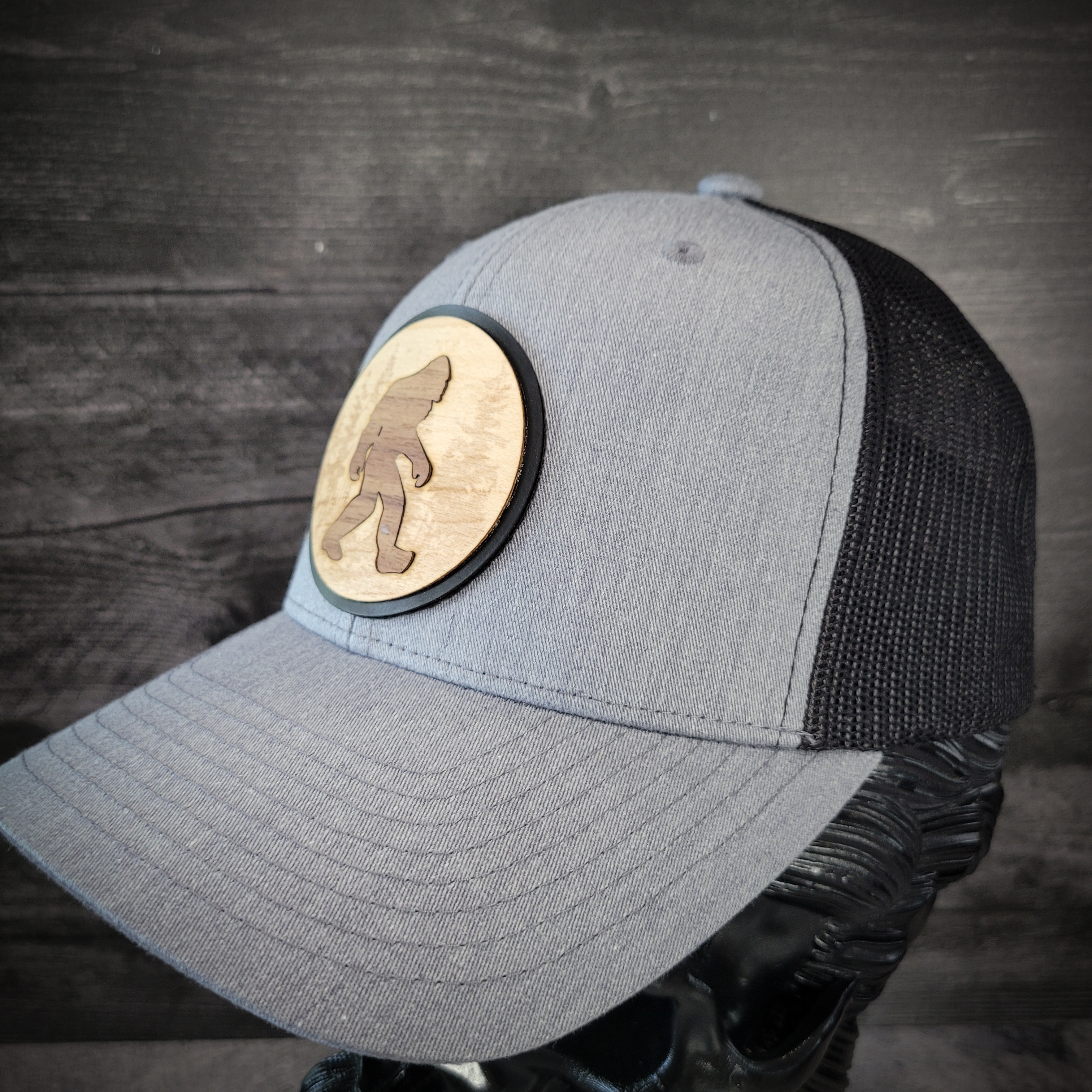 🦶🌲 The Hide & Seek Champion – Bigfoot Wooden Patch Trucker Hat