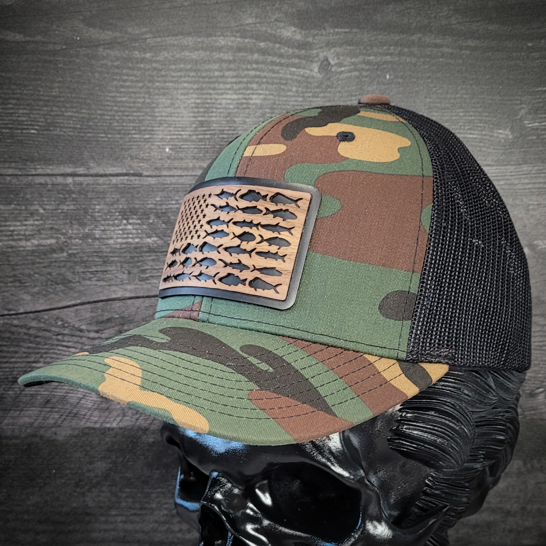 🎣 The American Angler – Wooden Patch Trucker Hat