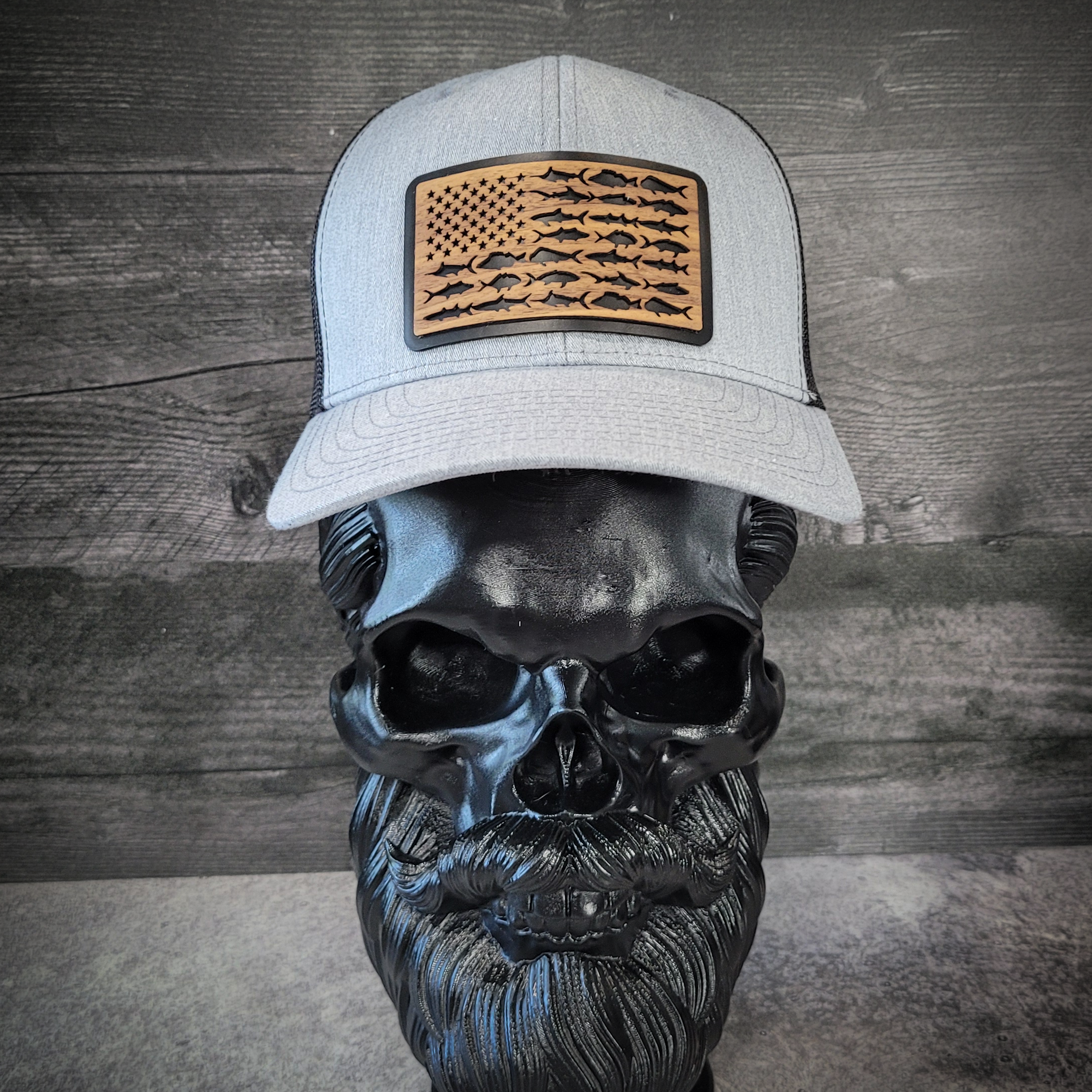 🎣 The American Angler – Wooden Patch Trucker Hat