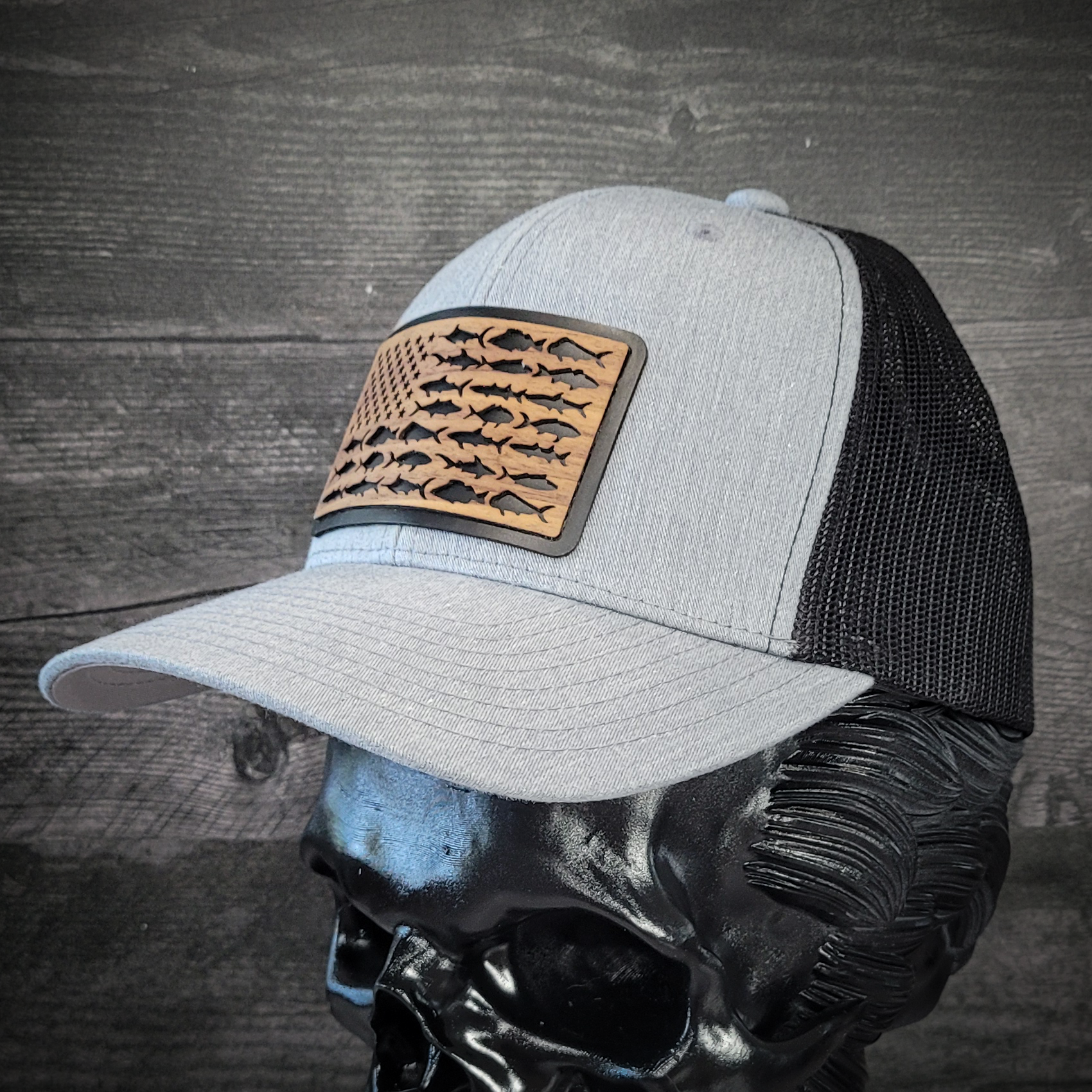 🎣 The American Angler – Wooden Patch Trucker Hat