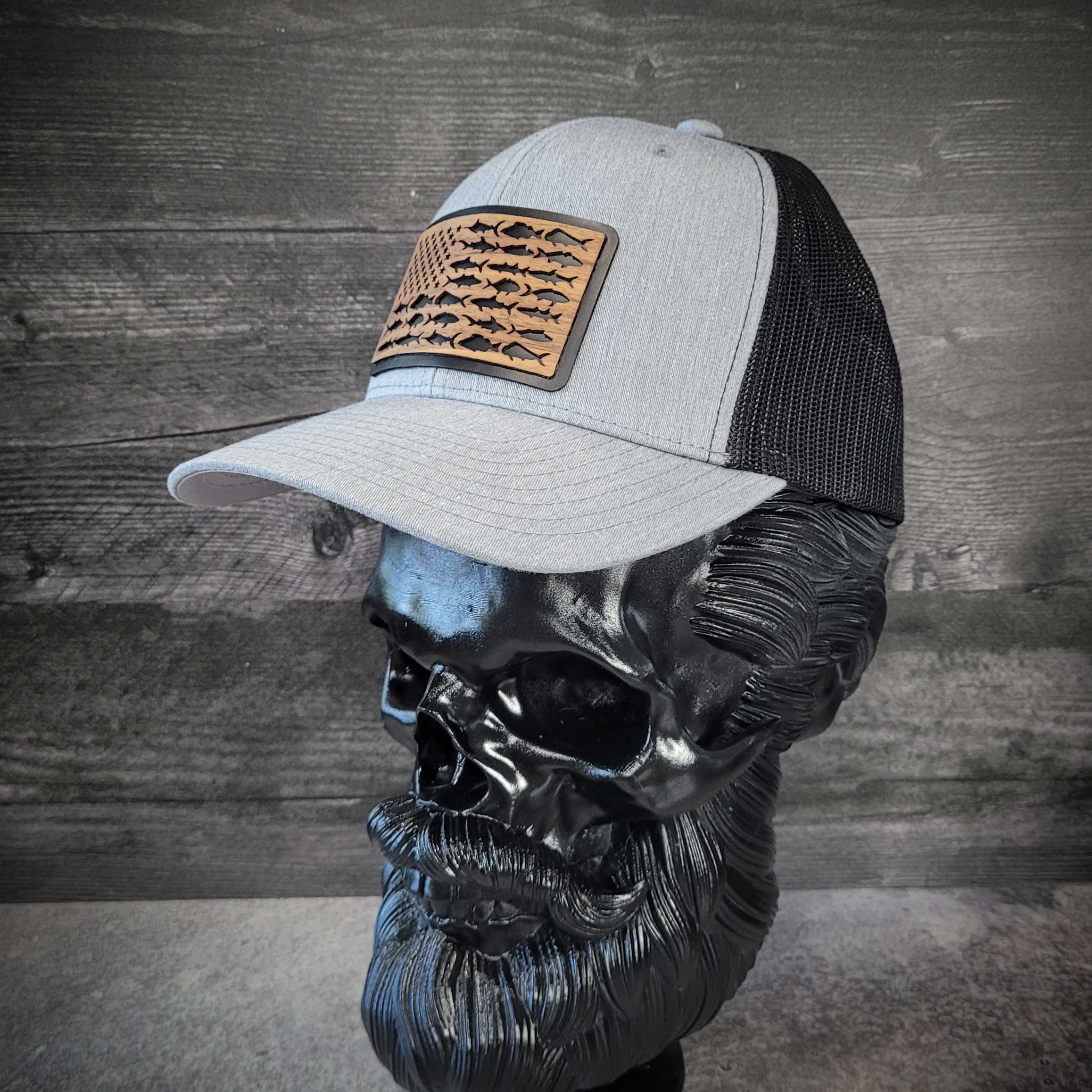 🎣 The American Angler – Wooden Patch Trucker Hat