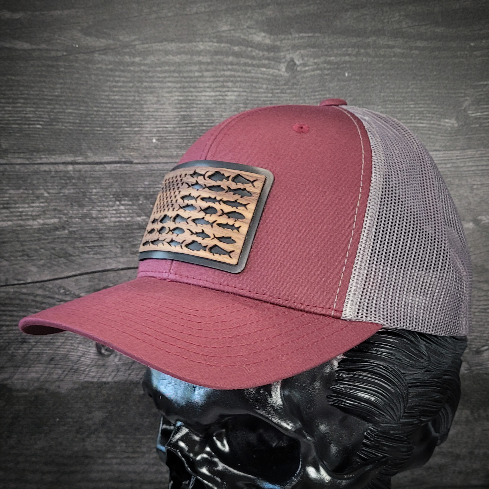 🎣 The American Angler – Wooden Patch Trucker Hat